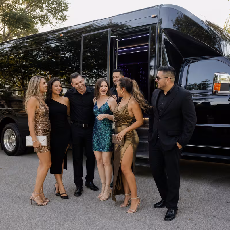 Passengers loading luggage while boarding an Dallas group shuttle