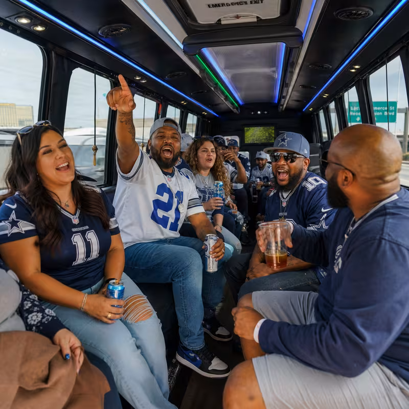 Group boarding a white charter bus for Sporting Event Transportation transportation in Dallas