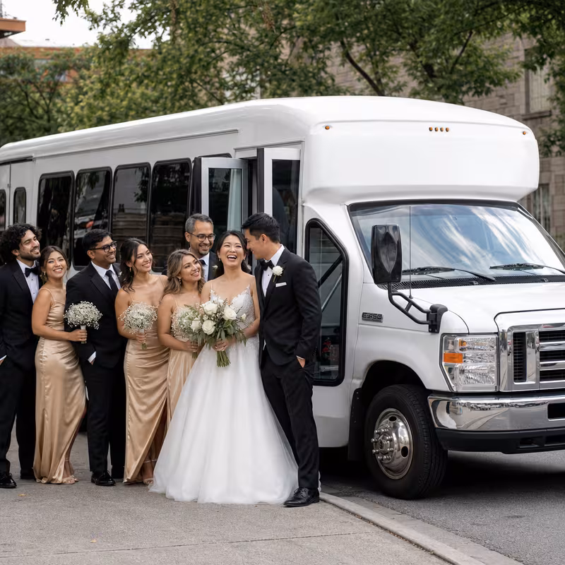 Passengers loading luggage while boarding an Dallas group shuttle